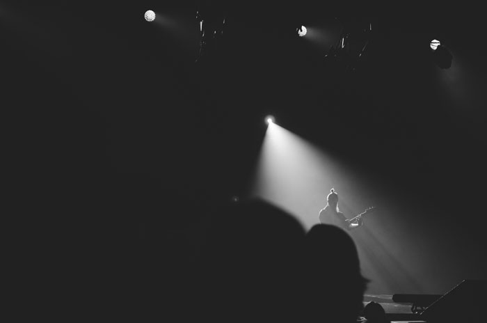 Guitarist alone on stage